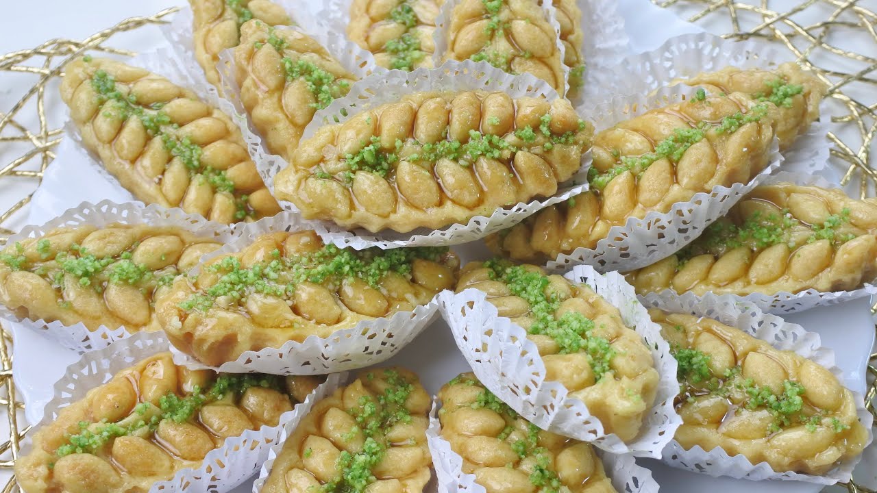 حلويات العيد🐏🐏 حلوة السنبلة /الظفيرة المعسلة الاقتصادية بدون بيض نتحداك جربيها ومتعاودهاش بنة خرافية