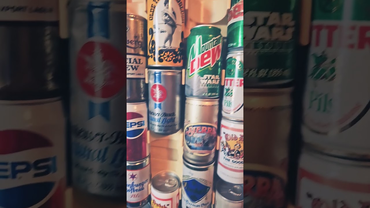 Vintage beer cans and plastic clip holder