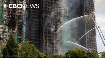 Thumbnail for Firefighters still on scene after Hong Kong fire that killed dozens