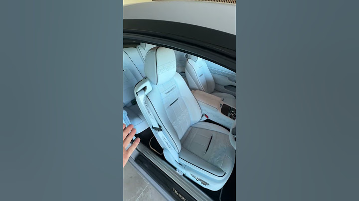 Mat Armstrong shows the finished Rolls Royce that Marcus Rashford crashed