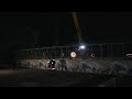 Грузовик снёс пешеходный мост камнедробилкой. Real video