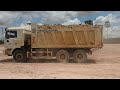 SHACMAN F2000 dump truck And Bulldozer SHANTUI SD22 at work