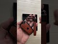 This car key cover slaps for BMW 4-button keys, constructed with premium leather and zinc alloy