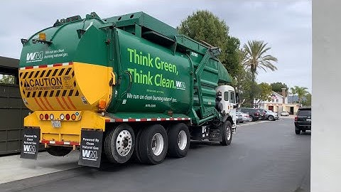 Waste Management Peterbilt 320 Amrep HX-450 Front Loader 212195 Emptying a Dumpster