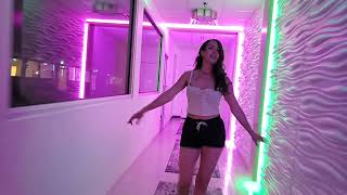 Chelsea walking down the Neon Runway at Pole Fitness Discovery inside Hot Yoga Plus in Palm Springs