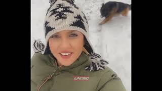 Woman gets face full of snow while sledding