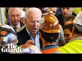 Joe Biden spars with Michigan autoworker over guns