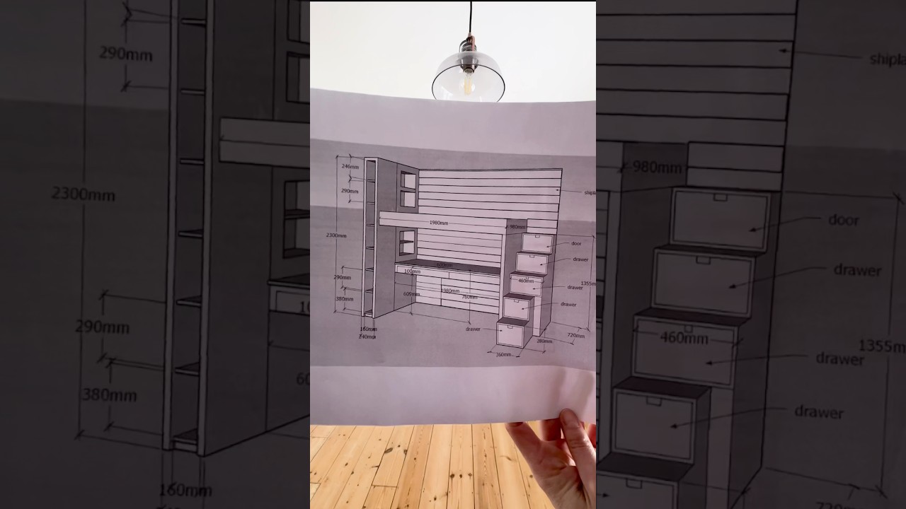 Bunk bed with bookshelf, desk and stairs with storage space
