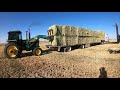 Stacking hay bales