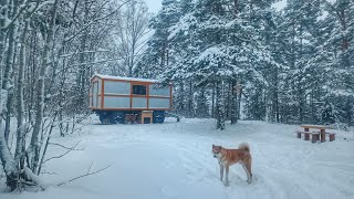 WINTER CAMPING in a CAMPER TRAILER using only a WOOD STOVE for heat.