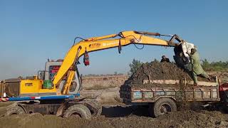 Huge excavator, heavy transporting, loading tractor for construction||huge excavator