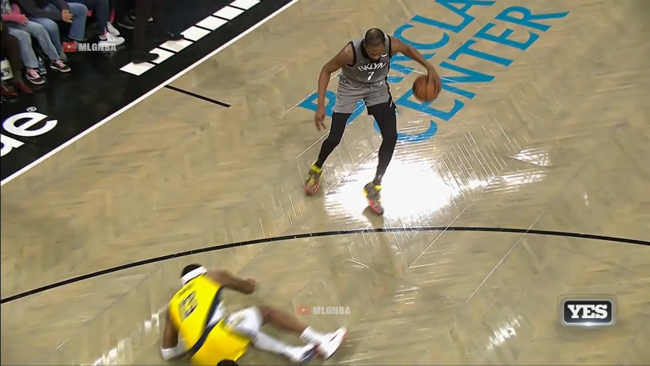 Kevin Durant sends Torrey Craig flying and drills a 3 😲