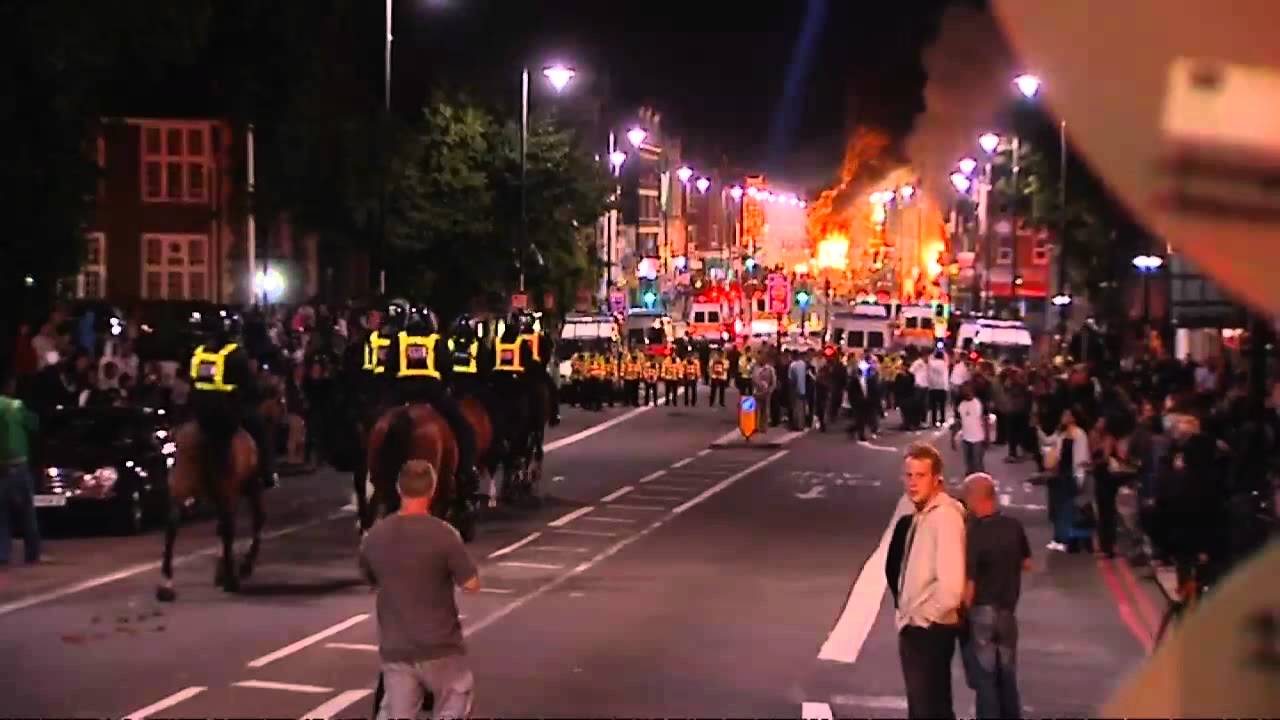 Row intensifies over police riot tactics - YouTube