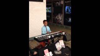 Boy Playing Piano In Nyc
