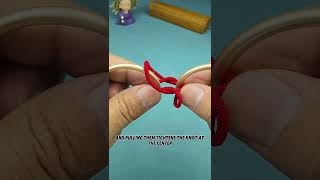 How can you skillfully separate the two red strings?#puzzle#iq#iqtest