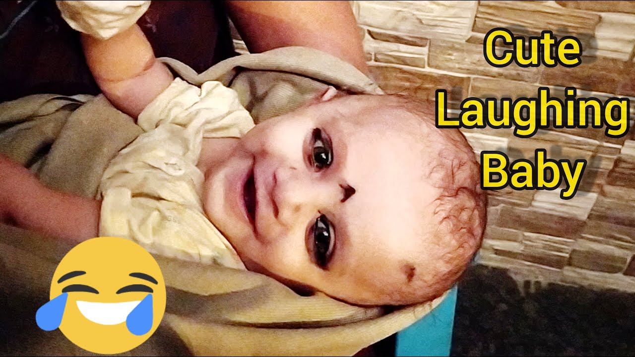 Three Month Old Baby Talking  With Family