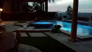 Custom Swimming Pool with Infinity Edge Spa, Fire and Water. Raised Infinity Edge Spa