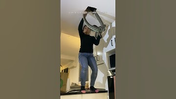 Snake catcher pulls two sparring carpet pythons from roof