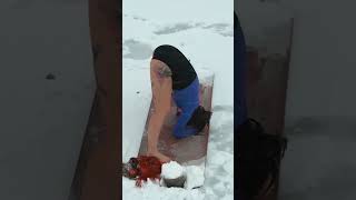 Evelina does stretching in the snow on the shore of the lake #stretching