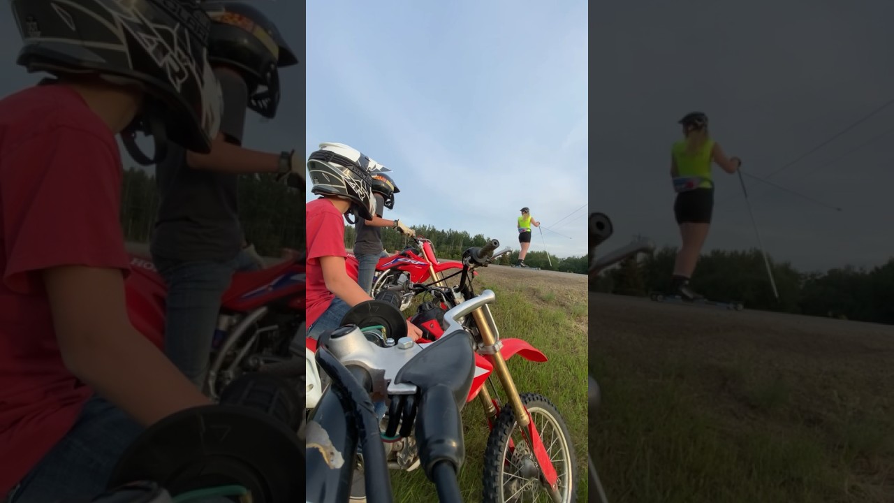 Woman skiing on asphalt by for bikers! 