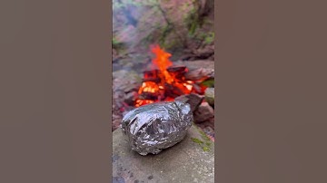 Fire foil chicken cook in jungle