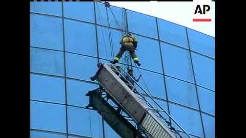 Two window washers in California have been rescued after dangling from a high-rise building after th