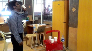 Automatic liquid filling machine by using sensors