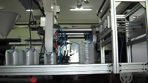 In Mold Labeling by Sigma Robots