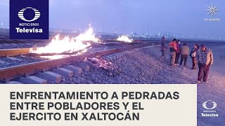 Se enfrentan a pedradas pobladores de Xaltocan con elementos de la Sedena - En Punto