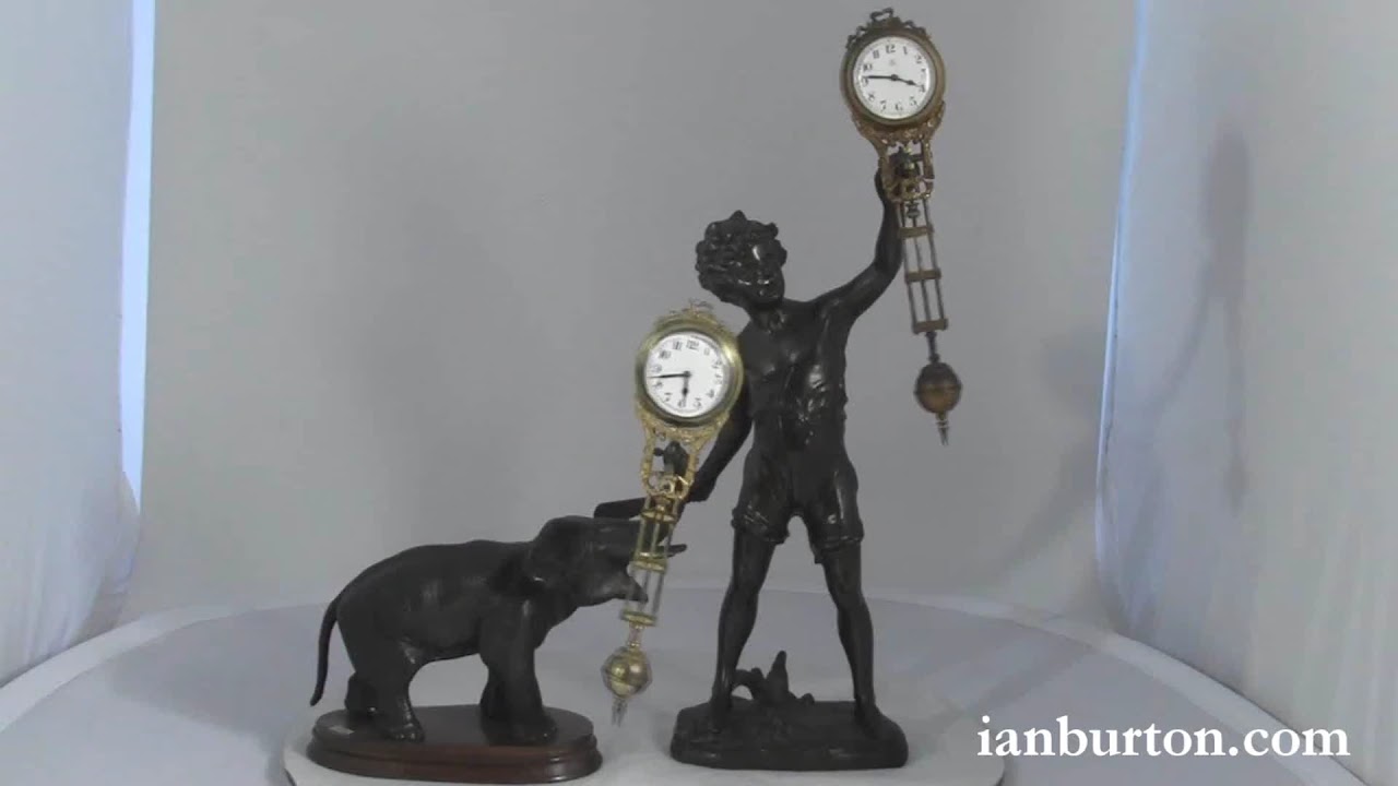 Two antique swinging mystery clocks by Junghans, Germany. circa 1900