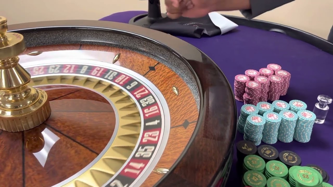 Mechanics of Spinning a Roulette Ball