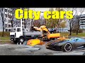 Unusual cars in the city. Selection of city cars.  Trucks, tanker, autocrane and more.