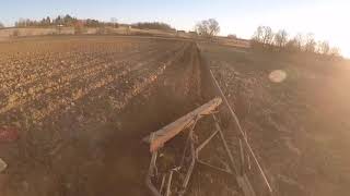 Plowing hay ground