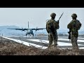 US and South Korean Combat Controllers guide aircraft to land on a highway