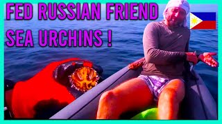 Fed  Russian friend sea urchins and he showed a waterfall in the Philippines