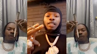 Naira Marley React as Fans Insult him for Smoking Big Jimbo Weed