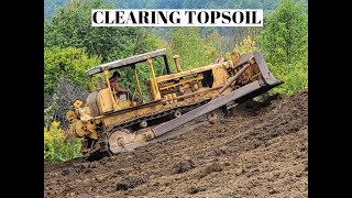 Caterpillar D8 clearing topsoil for my new shop