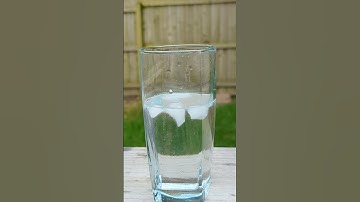 Ice cubes in hot water timelapse