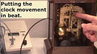 Putting the clock movement into Beat. Clock repair basic timing and regulating tips explained.