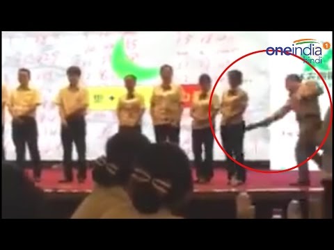 Chinese manager spanking female employees for poor performance, watch video | वनइंडिया हिन्दी