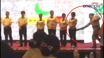 Chinese manager spanking female employees for poor performance, watch video | वनइंडिया हिन्दी