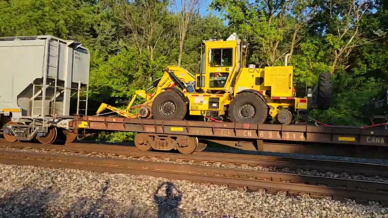 CN 2320 Eastbound local freight cars, track work equipment train through Vicksburg, MI