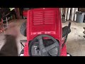 How to adjust the turning radius and alignment on a riding lawnmower.