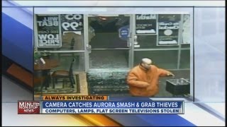 Camera catches crooks smashing glass door at Aurora store