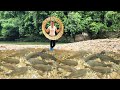 The girl made an ancient fish trap, and caught a lot of fish in the stream. | Ana fishing