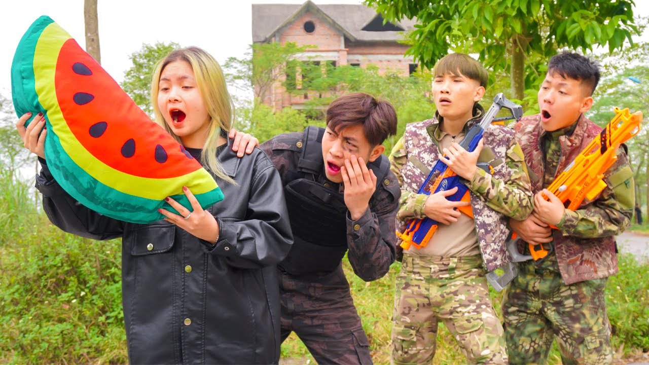 Action Nerf War: Couple Idiots Nerf Guns Robber Group Fruit Watermelon Battle