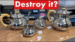 What do you do with an antique silver tea set with ivory handles?