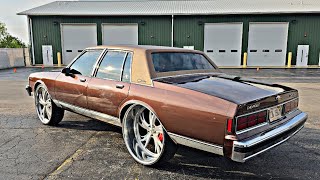 Betitupkustom finishes this Brougham on 28s Billetspecialties with a big lip