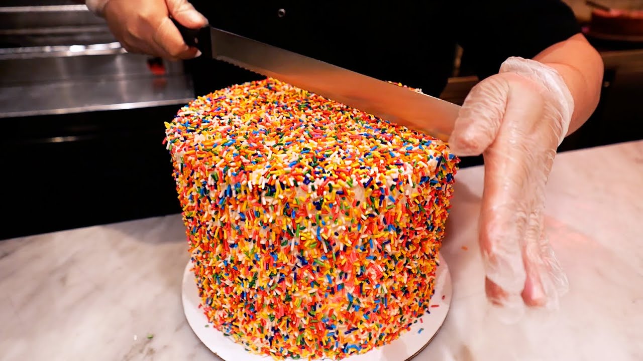 ⁣American Food - 24 LAYER RAINBOW CONFETTI CAKE Maison Pickle New York City