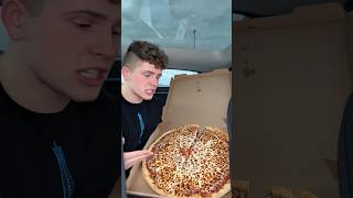 Eating Sam’s Club pizza and doing a cheese pull test